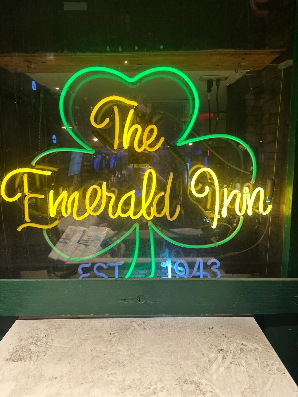 The Neon Emerald Inn Sign